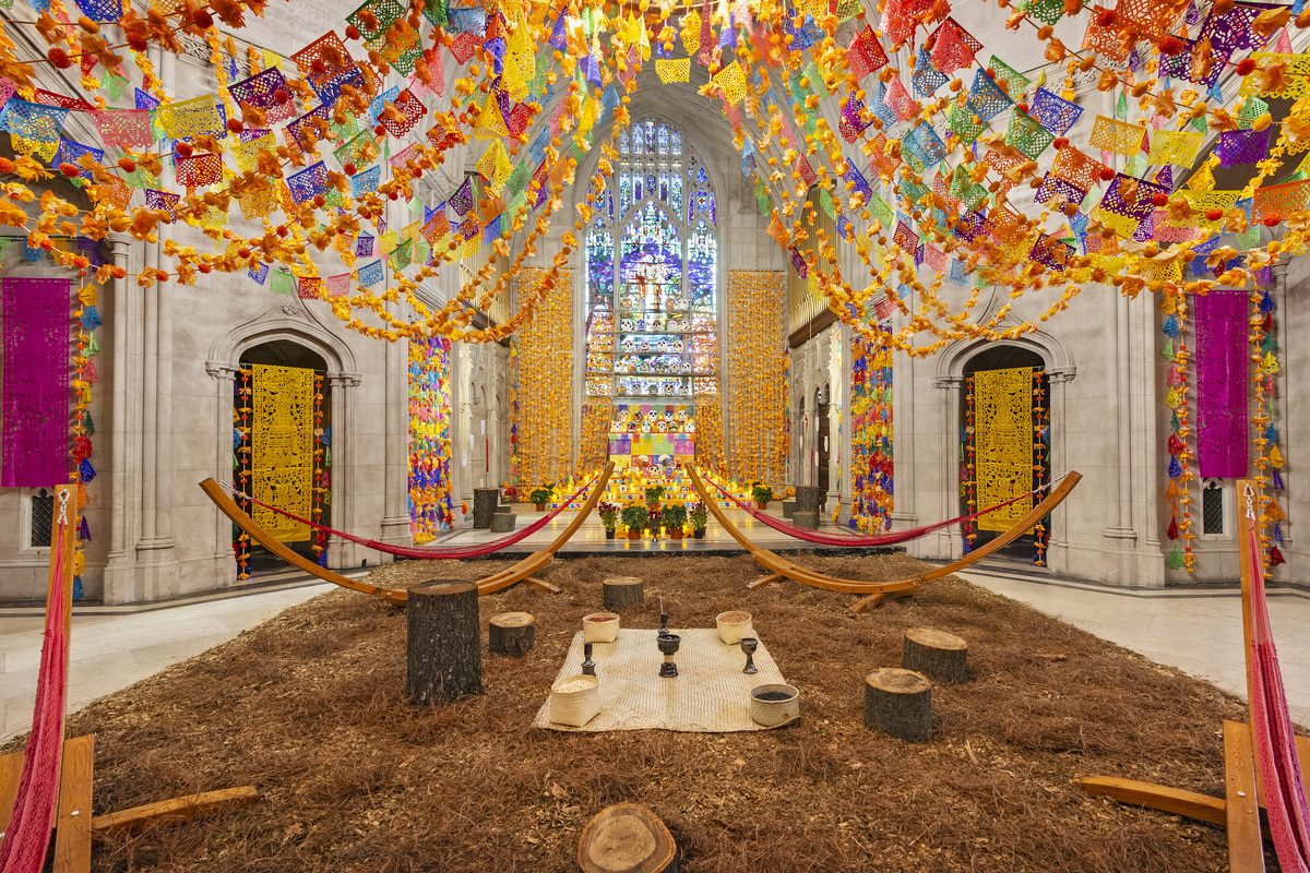 Green-Wood Chapel with Día de Muertos participatory altar and cut-paper banners