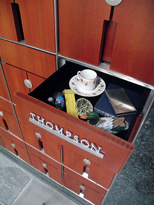 Cherry wood niche with unique remembrance cabinet belowCredit: Green-Wood