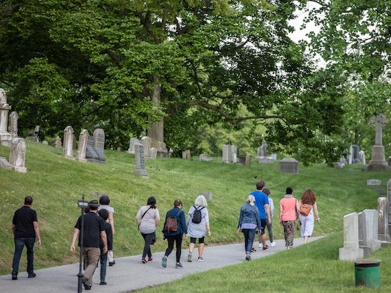 walking group on cemetery path